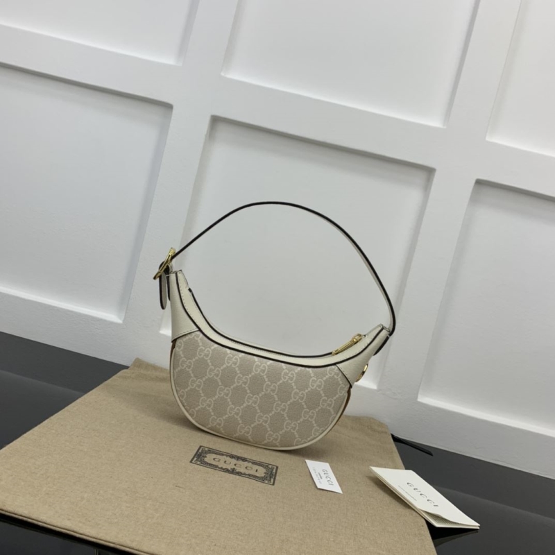 G*u*i top handle bags